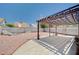The backyard has a covered patio, rock garden and is gravel-filled for easy care at 4212 Estaban Ct, Las Vegas, NV 89110