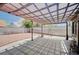 A backyard featuring a shaded patio area and desert landscaping, perfect for outdoor living at 4212 Estaban Ct, Las Vegas, NV 89110