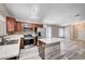 Well-equipped kitchen featuring stainless steel appliances, dark cabinets, and a central island, perfect for cooking at 4212 Estaban Ct, Las Vegas, NV 89110