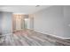 Bright living room featuring hardwood floors and neutral wall colors, offering a clean and modern aesthetic at 4212 Estaban Ct, Las Vegas, NV 89110