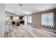 Open-concept living room featuring modern hardwood floors and neutral color palette, bright and inviting at 4212 Estaban Ct, Las Vegas, NV 89110