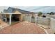 Fenced yard and covered patio create an outdoor living space at 4314 Flaming Ridge Trl, Las Vegas, NV 89147