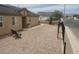 Single story home features a bench and desert rock yard at 4314 Flaming Ridge Trl, Las Vegas, NV 89147