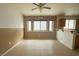 Spacious living area featuring tiled floors, breakfast bar and natural light for comfortable living at 4314 Flaming Ridge Trl, Las Vegas, NV 89147