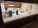 Traditional kitchen featuring tile countertops and wood cabinetry at 4928 E Philadelphia Ave, Las Vegas, NV 89104