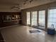 Open living space with sliding doors leading to the outside at 4928 E Philadelphia Ave, Las Vegas, NV 89104