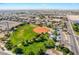 Panoramic aerial view of a baseball field, playground, and surrounding suburban area at 5417 Bible Cir, North Las Vegas, NV 89031