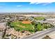 Wide aerial view showcasing a baseball field, park, and surrounding cityscape at 5417 Bible Cir, North Las Vegas, NV 89031