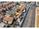Bird's-eye view of a house with a pool, solar panels, and a charming neighborhood setting at 5417 Bible Cir, North Las Vegas, NV 89031
