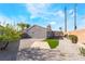 Backyard features gravel and a patch of artificial grass at 5417 Bible Cir, North Las Vegas, NV 89031