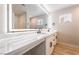 Modern bathroom featuring double sinks, sleek countertops, and a large, well-lit mirror for a spa-like feel at 5417 Bible Cir, North Las Vegas, NV 89031