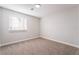 Bedroom with neutral carpet, recessed lighting, and a window with natural light at 5417 Bible Cir, North Las Vegas, NV 89031