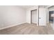 Bedroom featuring neutral carpet, access to a closet, and an ensuite bathroom at 5417 Bible Cir, North Las Vegas, NV 89031
