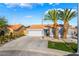 Attractive one-story residence with a white garage door and meticulously landscaped front yard at 5417 Bible Cir, North Las Vegas, NV 89031