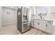 Stainless steel refrigerator next to sleek cabinets and countertops, blending style and functionality at 5417 Bible Cir, North Las Vegas, NV 89031