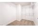 Walk-in closet featuring neutral carpet and built-in wire shelving for optimal storage at 5417 Bible Cir, North Las Vegas, NV 89031