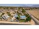 Vast aerial view displays property nestled in a community near desert terrain with mountain views at 5515 N Campbell Rd, Las Vegas, NV 89149