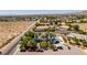 Scenic aerial view shows the home's position in a quiet neighborhood with desert landscape at 5515 N Campbell Rd, Las Vegas, NV 89149