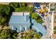 Overhead shot highlighting the property's unique roofline, mature trees, and backyard layout at 5515 N Campbell Rd, Las Vegas, NV 89149