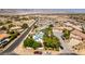 Panoramic view shows property situated in a desert community with mountain views in the distance at 5515 N Campbell Rd, Las Vegas, NV 89149