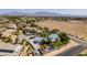 Expansive aerial view of the desert landscape surrounding a single-Gathering home with a blue-tiled roof at 5515 N Campbell Rd, Las Vegas, NV 89149
