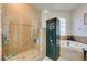 Bathroom featuring a walk-in shower, soaking tub, and a secure safe at 5515 N Campbell Rd, Las Vegas, NV 89149