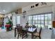 Bright dining area showcases natural light, space for seating, and a seamless connection to other living areas at 5515 N Campbell Rd, Las Vegas, NV 89149