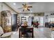 Spacious dining area featuring a large table, tile flooring, and abundant natural light at 5515 N Campbell Rd, Las Vegas, NV 89149