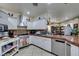 Open kitchen featuring stainless steel appliances, gas range, and ample counter space for Gathering meals and entertaining at 5515 N Campbell Rd, Las Vegas, NV 89149