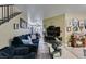 Cozy living room featuring comfortable seating, decorative accents, and easy access to the kitchen at 5515 N Campbell Rd, Las Vegas, NV 89149