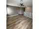 Upstairs loft area with hard wood flooring, ceiling fan and natural light at 5709 Nobleton Ct, North Las Vegas, NV 89081