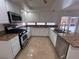 Well-appointed kitchen featuring stainless steel appliances, and granite countertops at 577 Leap Frog Ave, Las Vegas, NV 89183