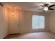 Inviting living room featuring a ceiling fan, and a window with natural light at 577 Leap Frog Ave, Las Vegas, NV 89183