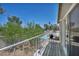 Private balcony overlooking the community pool, perfect for relaxation and outdoor enjoyment at 6815 Garden Grove Ave, Las Vegas, NV 89103