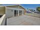 This is a spacious balcony with sliding glass doors to the interior of the home at 6815 Garden Grove Ave, Las Vegas, NV 89103