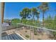 Outdoor balcony with white metal railing and landscaping at 6815 Garden Grove Ave, Las Vegas, NV 89103