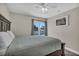 Bright bedroom with sliding glass door that leads to a private balcony and stylish furnishings at 6815 Garden Grove Ave, Las Vegas, NV 89103