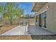 A backyard patio offers outdoor living, complete with a grill for barbecues and entertaining at 6815 Garden Grove Ave, Las Vegas, NV 89103
