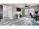 Bright and spacious upstairs office with two desks and ceiling fan at 688 Monument Point St, Henderson, NV 89002