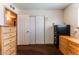A spacious room with dual closets and neutral walls that offers space and flexibility to make it your own at 704 N Wallace Dr, Las Vegas, NV 89107
