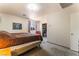 A cozy bedroom with a large bed and a walk-in closet, perfect for relaxation and organization at 704 N Wallace Dr, Las Vegas, NV 89107