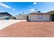 Charming single-story home featuring a well-maintained front yard with tasteful desert landscaping at 704 N Wallace Dr, Las Vegas, NV 89107