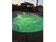 Backyard pool and spa with gazebo and lush landscaping, perfect for outdoor entertaining at 704 N Wallace Dr, Las Vegas, NV 89107