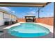 Sparkling pool in a private backyard setting with spa and gazebo at 704 N Wallace Dr, Las Vegas, NV 89107