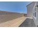 Spacious backyard featuring a block wall, ideal for creating an outdoor oasis at 7086 Parkallen Ave, Las Vegas, NV 89113