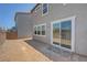 View of the backyard featuring a sliding glass door for seamless indoor-outdoor living at 7086 Parkallen Ave, Las Vegas, NV 89113