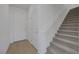 Bright entryway featuring hardwood floors, stairs, and access to other rooms at 7086 Parkallen Ave, Las Vegas, NV 89113