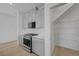 Well-equipped kitchen with modern appliances, ample cabinet space, and an adjacent pantry at 7086 Parkallen Ave, Las Vegas, NV 89113