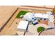 Expansive property featuring a dome-shaped home, modern landscaping, and a spacious desert lot at 7215 Ullom Dr, Las Vegas, NV 89118