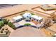 Unique home with a gated entrance, circular driveway, dome architecture, and low-maintenance landscaping at 7215 Ullom Dr, Las Vegas, NV 89118